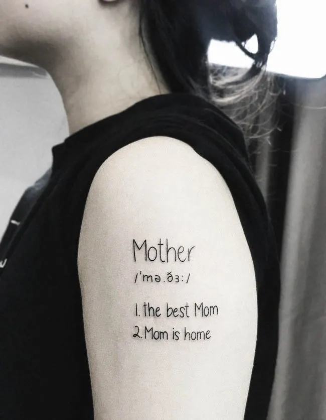 Definition of mom by @flowers.tattooist
