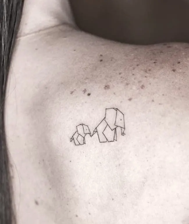 Elephant mom tattoo on the shoulder by @danirg.home