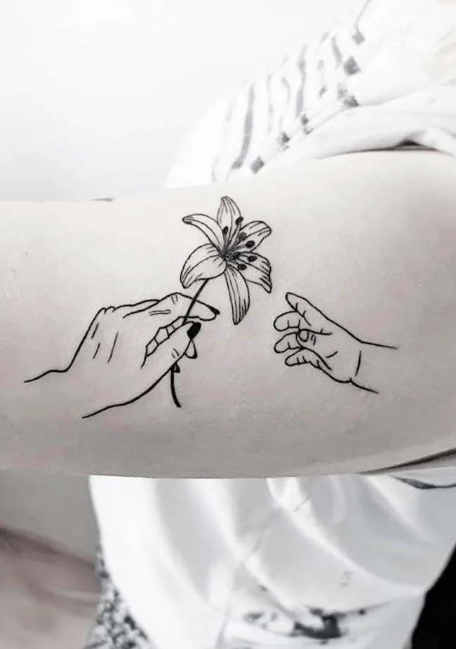Flower tattoo for mom by @kinka_ink