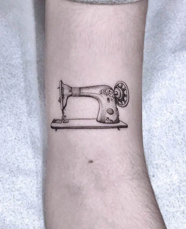 Sewing machine tattoo for mom by @wcosta.tattoo